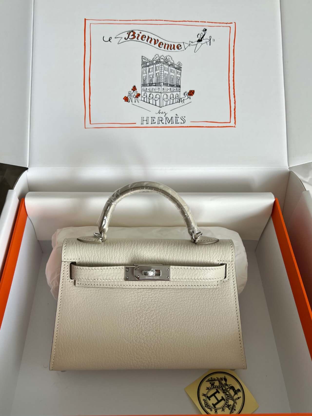 HERMÈS Kelly 奶白色荔枝纹手提凯莉包