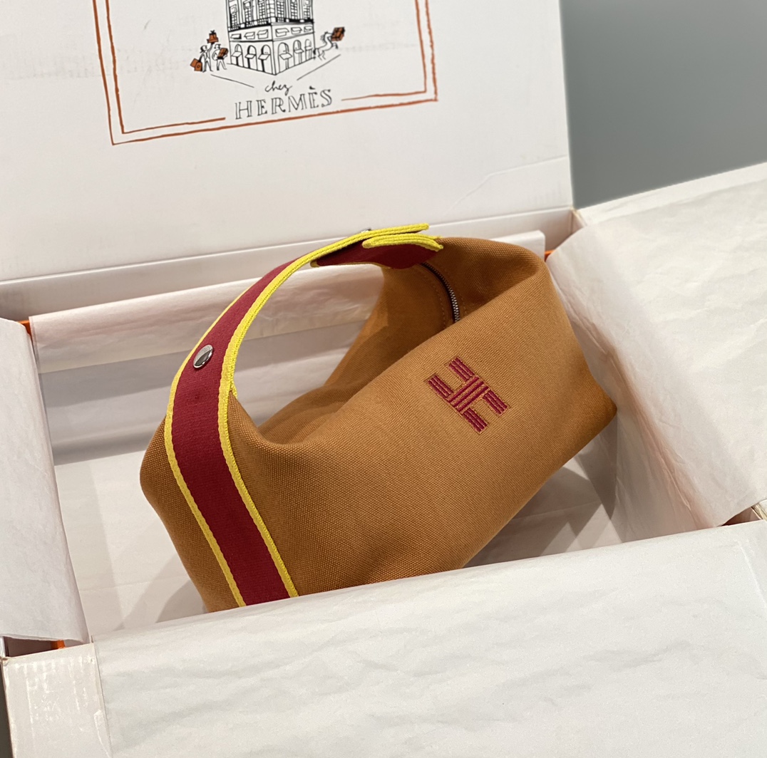 爱马仕HERMES 焦糖撞色帆布手提收纳包